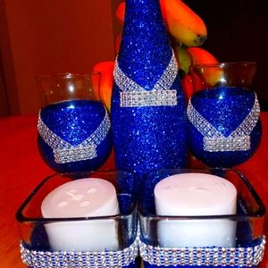 Wine bottle...2 wine glasses and 2 candle holders